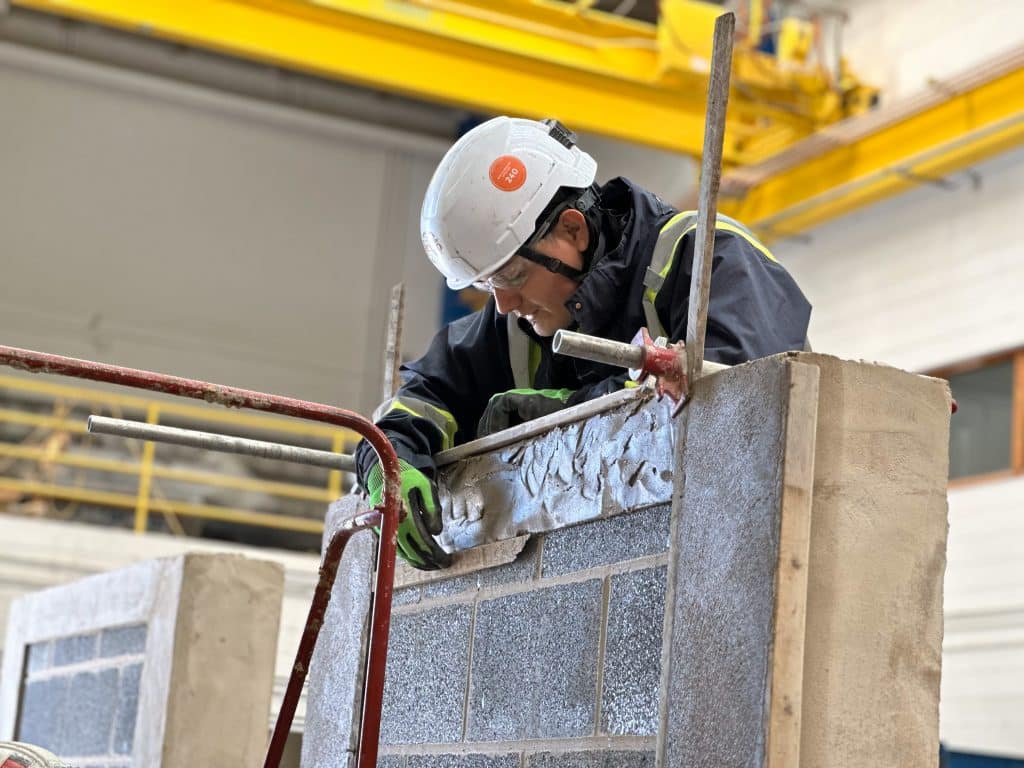 Contractor working on wall